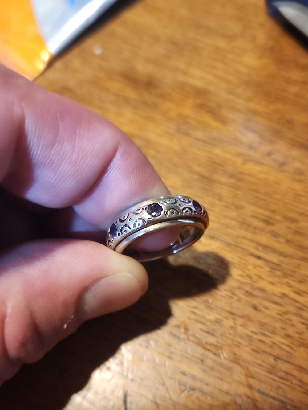 Sterling Silver Women’s Spinner Ring with Dark Blue Sapphire